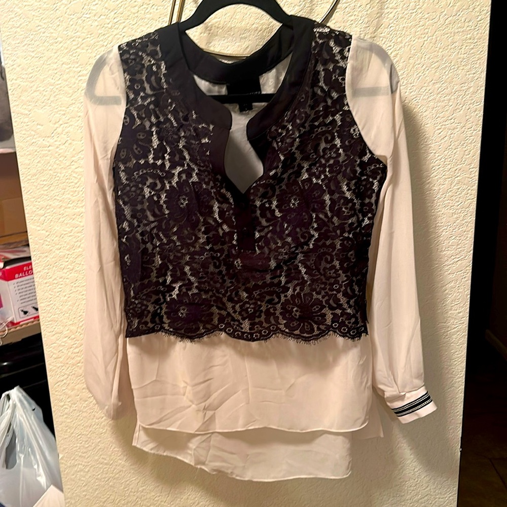 Cream and black blouse
